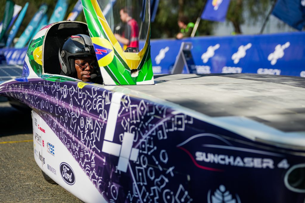 Tshwane University of Technology engineering student takes the wheel of the SunChaser 4 as the student-built solar car begins its gruelling journey from Sasolburg to Cape Town. PHOTO: Supplied