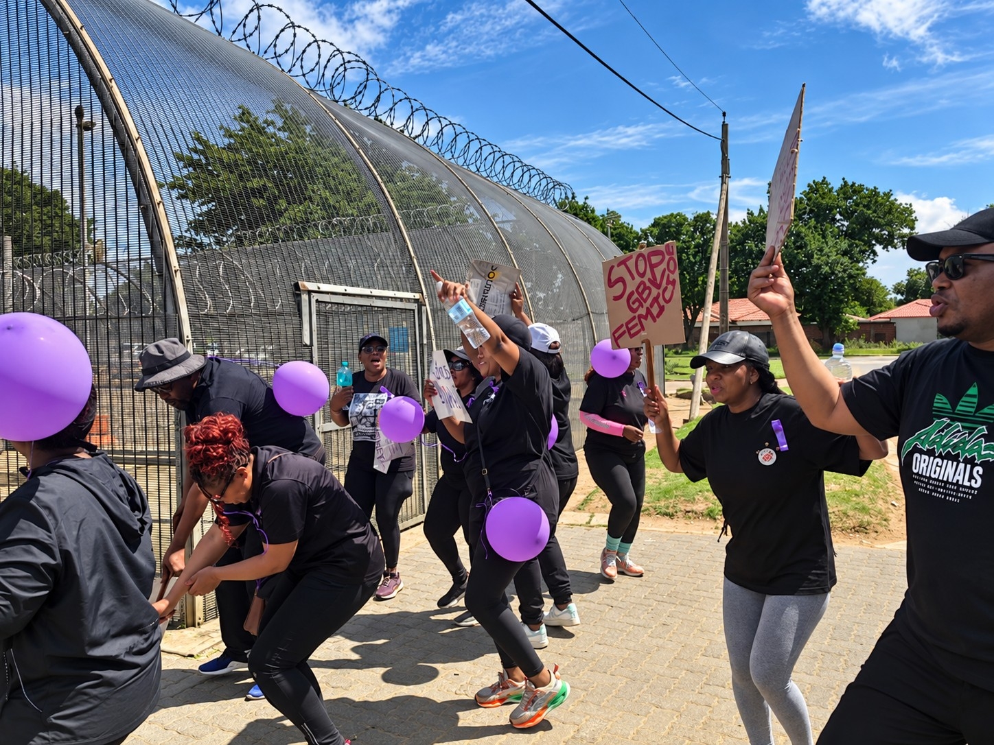 Police and Correctional Services officials take a stand against gender-based violence and femicide during a five-kilometre Community in Blue awareness walk through the Sasolburg CBD on Wednesday, 14 October. Photo:Supplied