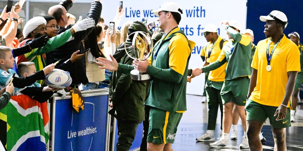 Riley Norton, Junior Springbok captain, greets fans.