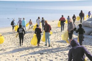 Community cleans river and beaches in West Coast