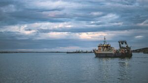 Sailing to work under a cloudy sky