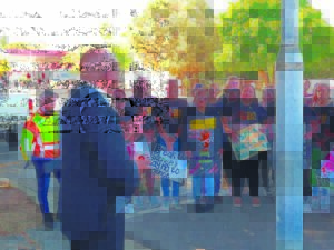 Group marches to court to foster awareness of domestic abuse