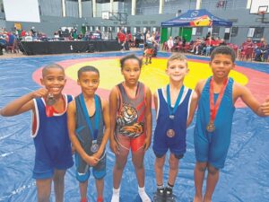 Jong Weskus-stoeiers bring medaljes huis toe