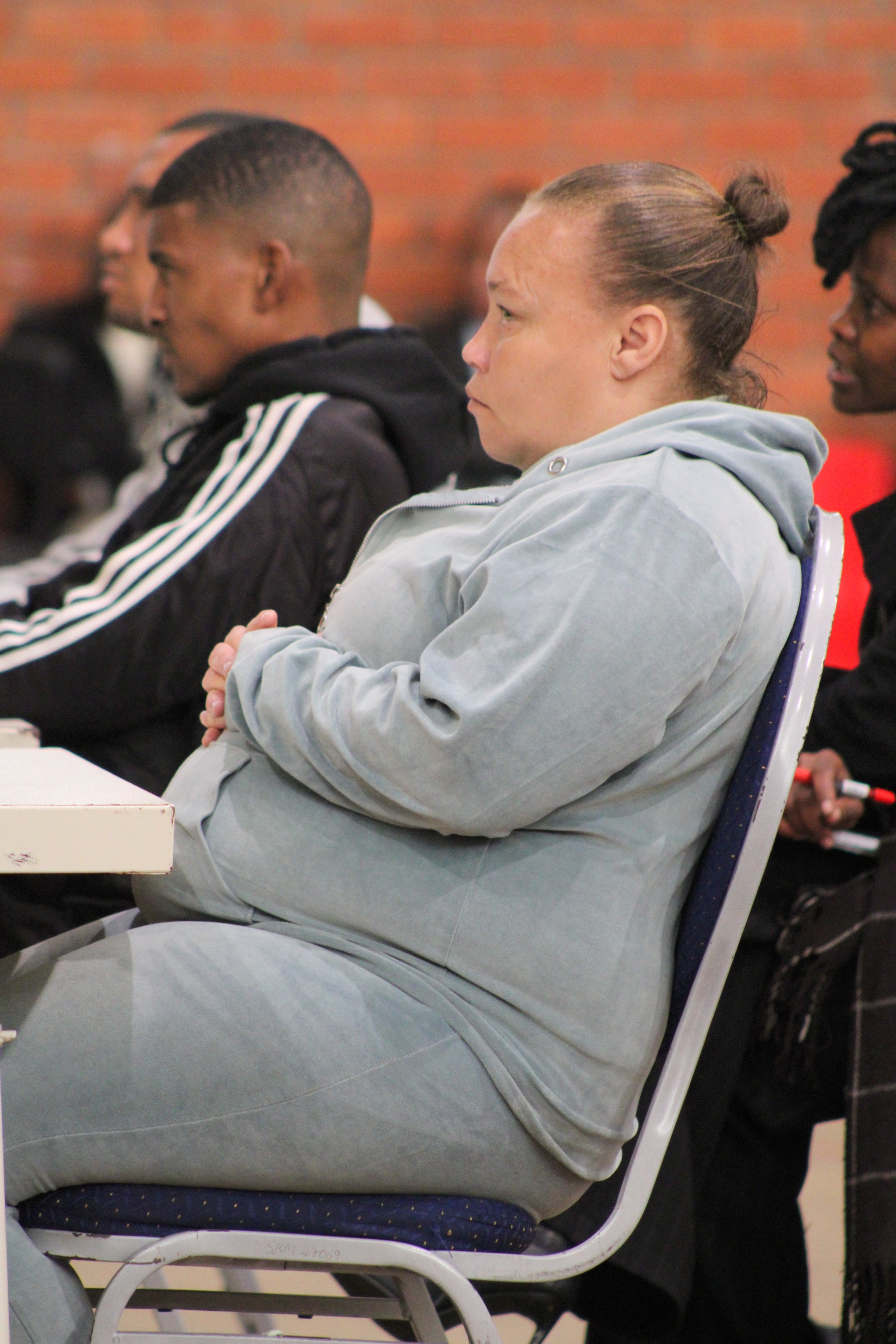 Die beskuldigdes hoor hul vonnis aan. Van links is Boeta Appolis, Steveno van Rhyn en Kelly Smith.