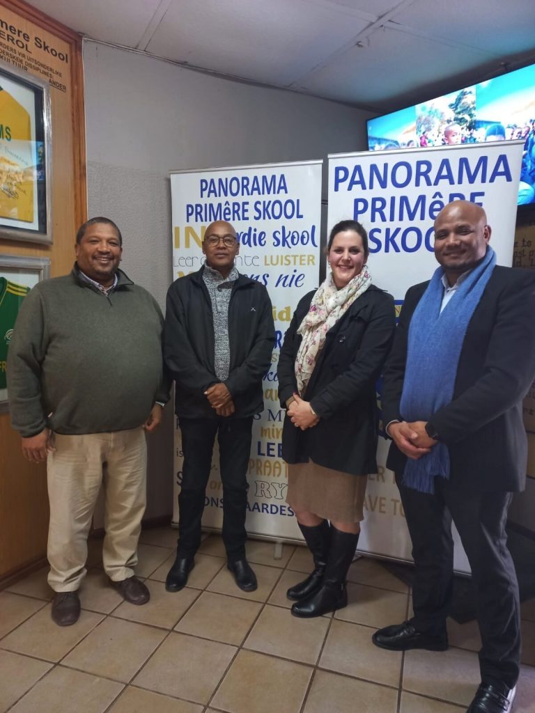 Panorama Primary School recently welcomed Taswald Andrews of the Western Cape Education Department (WCED) head office, who is involved in learner support, back to the school. For the school, although this past pupil's visit was made in his official capacity, it was special, according to principal Hylton Langley. He said Panorama was incredibly proud of all he had accomplished. "Mr Andrews' visit serves as an inspiring reminder of what our learners are capable of achieving. It is always heartwarming to see our former learners excel and give back to the education sector. We extend our best wishes to Mr Andrews for continued success in his career and thank him for taking the time to visit. His journey is a shining example to our current learners of the heights they too can reach with hard work and dedication." From left are Hylton Langley (principal), Terrence Smith (deputy principal), Hestia de Villiers (learning-support teacher) and Taswald Andrews.