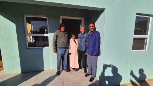 BM hands keys to home owners