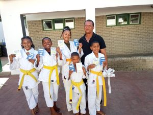 Louwville-judoka sien geel