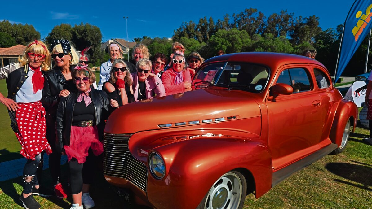 Classic cars and 1950s outfits graced the lawns of the Langebaan Bowling Club, inspired by the musical Grease.