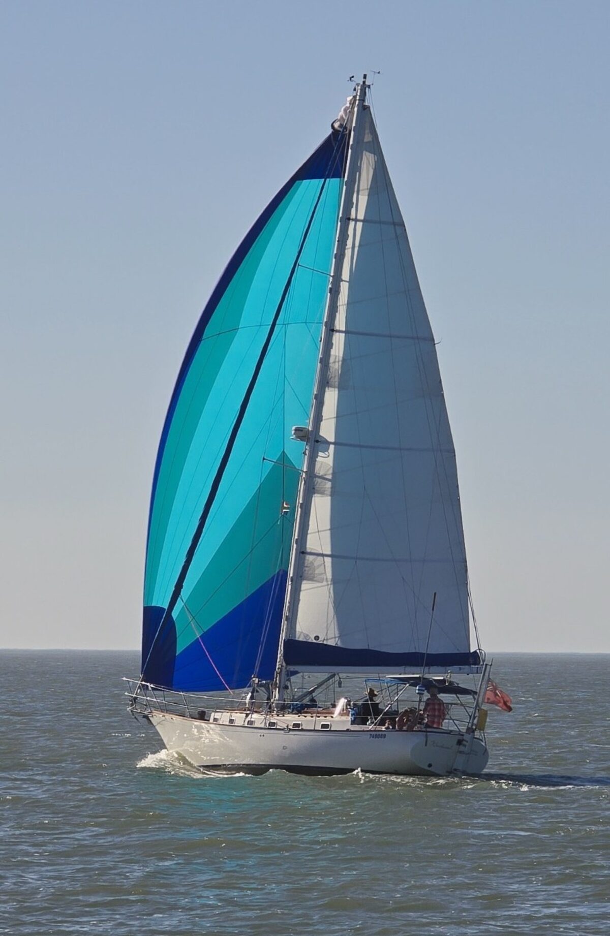 The beauty of sailing captured during the end-of-season sail at Port Owen: Skipper Dean Richard on his yacht Windward.