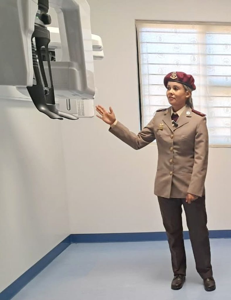 Major Yumna Autumn, a dentist at the sickbay, explains the dental X-ray machine to journalists.
Photo: Alida Buckle