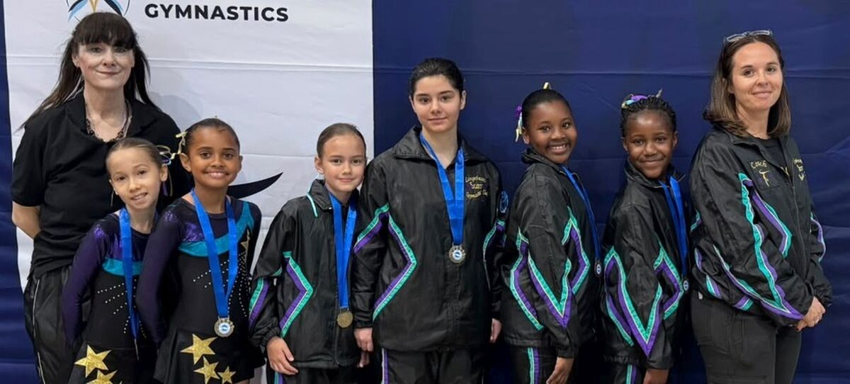 Langebaan Stars gymnasts with hteir coaches.