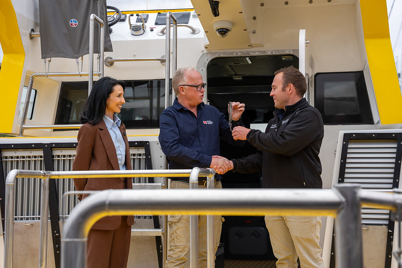 Nic Stevens, Station 4 Mykonos Station Commander (right) receives the keys to the boat. Photo: NSRI