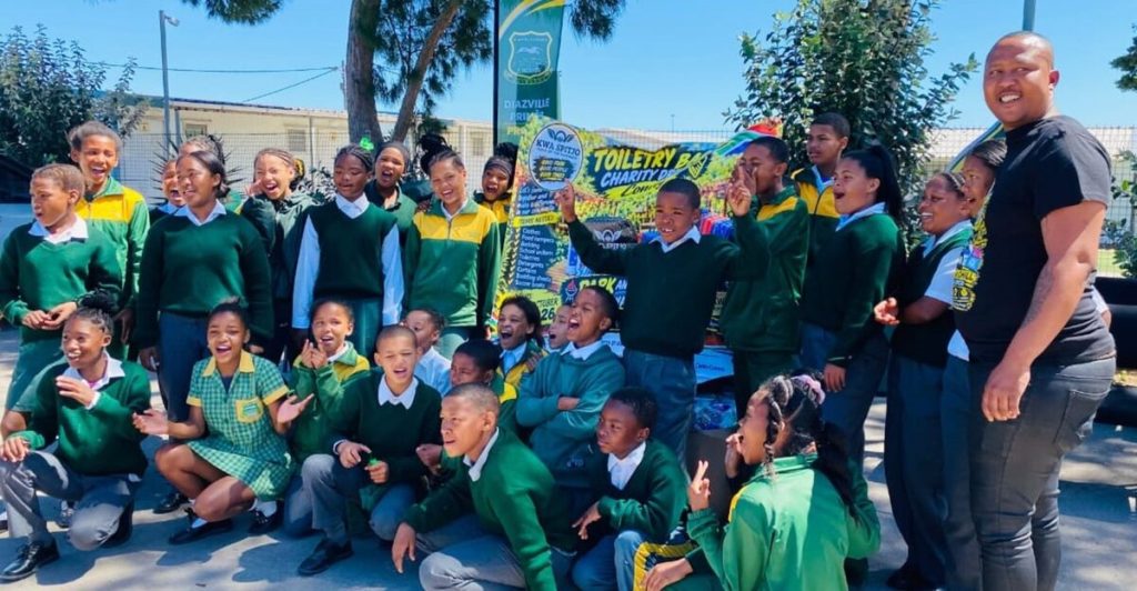 The learners of Diazville Primary School with Brianstin Yokwe (right).