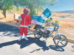 Vader Kersfees ry motorfiets