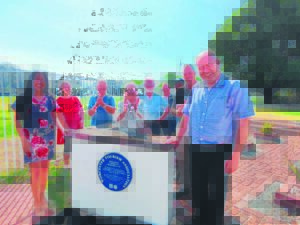 Historiese tuin kry blou plaket