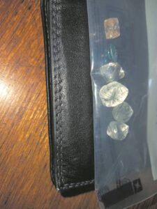 Caught with six uncut diamonds at Mall
