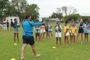 Rugby girls practice their moves at rugby clinics in Ceres and Worcester
