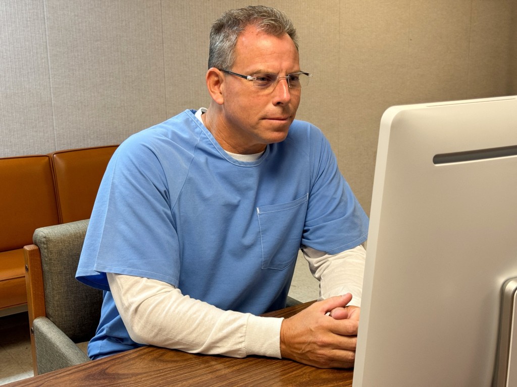In this handout photo released by the California Department of Corrections, Erik Menendez appears before the parole board via teleconference on August 21, 2025, at the Richard J. Donovan Correctional Facility in San Diego, California. On August 21, a judicial commission in California denied parole to Erik Menendez who, along with his brother Lyle, murdered his wealthy parents in their Beverly Hills mansion in 1989. The 54-year-old inmate "was denied parole for three years at his initial suitability hearing," corrections officials said, after failing to convince the panel that he is reformed and no longer poses a threat to the public. (Photo by California Department of Corrections / AFP) / RESTRICTED TO EDITORIAL USE - MANDATORY CREDIT "AFP PHOTO / HANDOUT / CALIFORNIA DEPARTMENT OF CORRECTIONS "