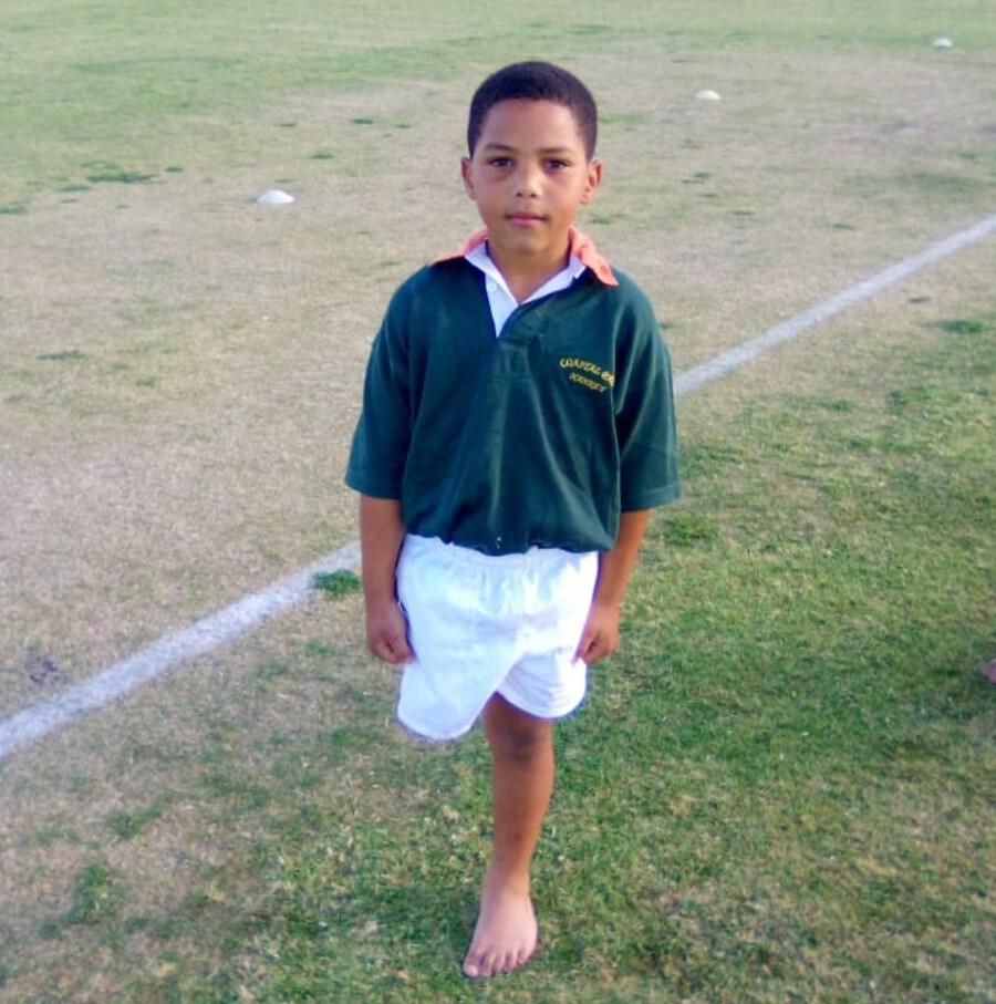 Oluthando Nkosinkulu on the rugby field.