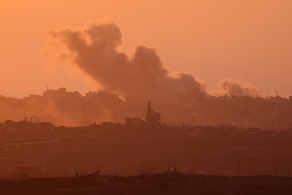 This picture taken from a position at Israel's border with the Gaza Strip shows smoke billowing during Israeli bombardment of the besieged Palestinian territory on September 16, 2025, amid the ongoing war between Israel and the Palestinian Hamas militant group. (Photo by Menahem KAHANA / AFP)