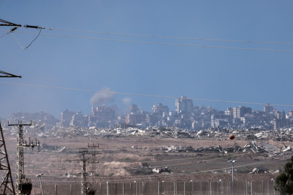 This picture taken from a position at Israel's border with the Gaza Strip shows smoke billowing amid Israeli bombardment of the besieged Palestinian territory on. Israel launched its ground assault on Gaza City before dawn on September 16. (Photo by Menahem Kahana / AFP)