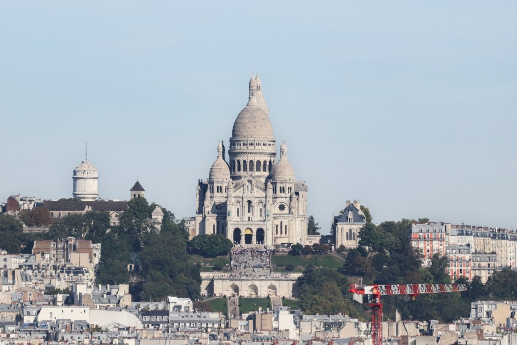 This photograph shows the view from the Notre-Dame Cathedral. (Photo by Ludovic Marin/ POOL / AFP)