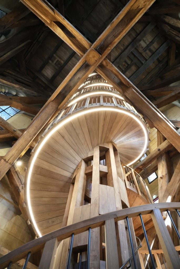This photograph taken during the inauguration ceremony of the new tour route of the Cathedral Towers Gothic structures destroyed following the April 2019 fire, shows the wooden stairs leading to the bell tower of Notre-Dame Cathedral, in Paris. (Photo by Ludovic Marin/ POOL / AFP)