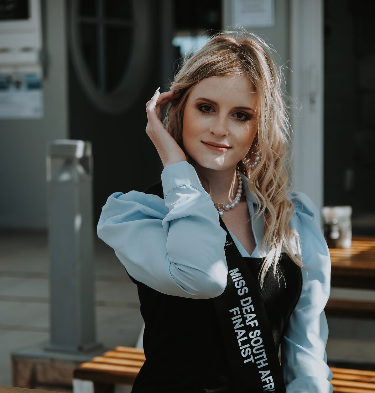 Quindeny Louw with a Miss Deaf South Africa sash on.