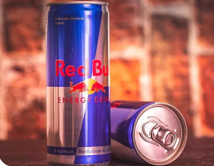 High-caffeine energy drinks such as Red Bull will be banned for sale to youths under 16 in England under plans announced by the government on Wednesday.