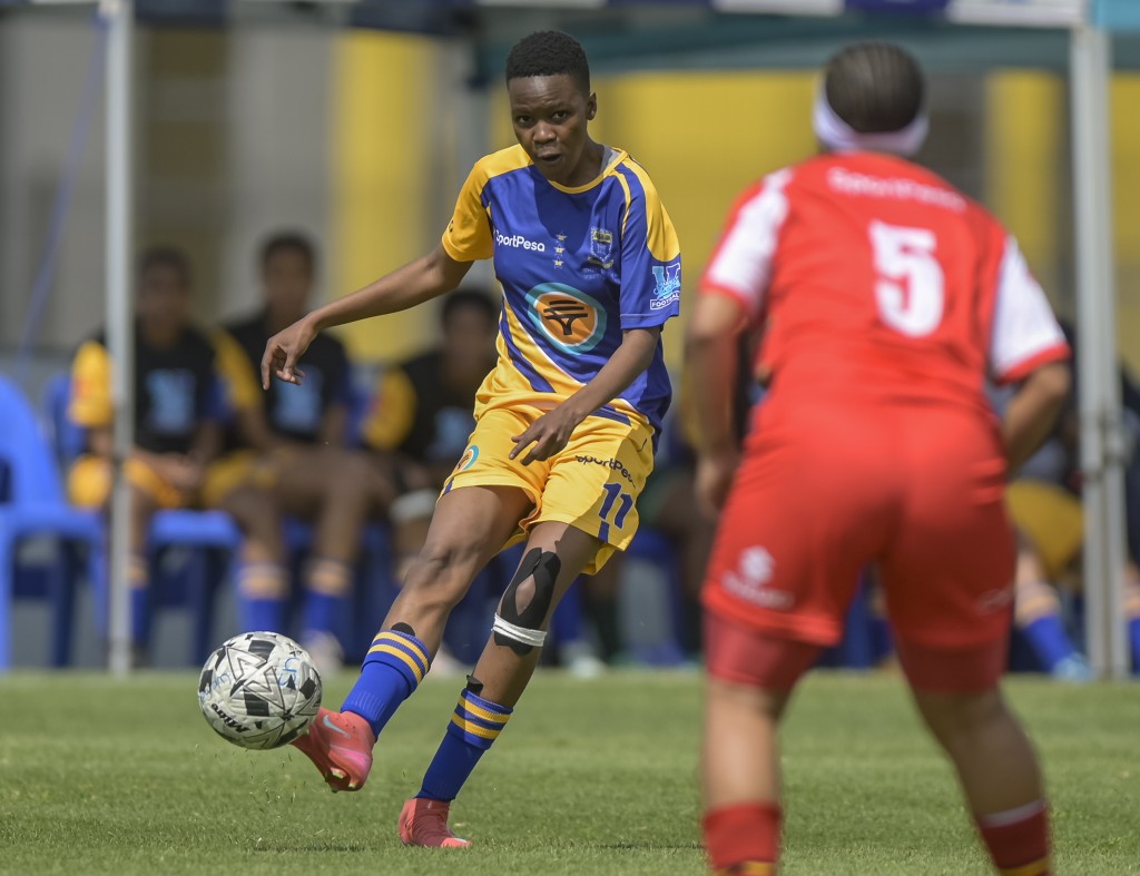 UWC's Bandile Mthethwa in possession during the reigning champions' professional 2-0 triumph over UP-Tuks that maintained their perfect tournament record. Photo: Christiaan Kotze/ASEM Engage