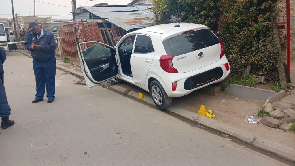 Police officers on the scene in Mgidlana Street, Asanda Village, where a 42-year-old man was murdered in a suspected taxi violence shooting on Thursday.
