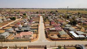 Public concerns arise over Thabong's R29 million road project, questioning transparency and cost despite local job creation and infrastructure improvements.