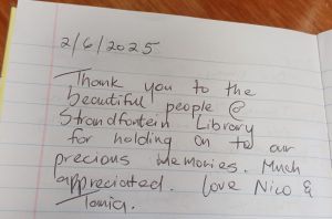 Library’s detective work reunites couple with wedding album after 20 years