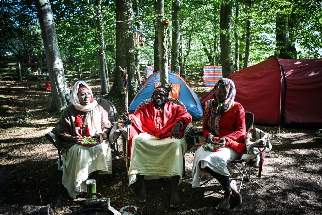 A dramatic police operation has brought an end to the controversial occupation of Scottish Borders woodland by members of a self-styled African tribe, with the entire eviction broadcast live to thousands of social media followers.
