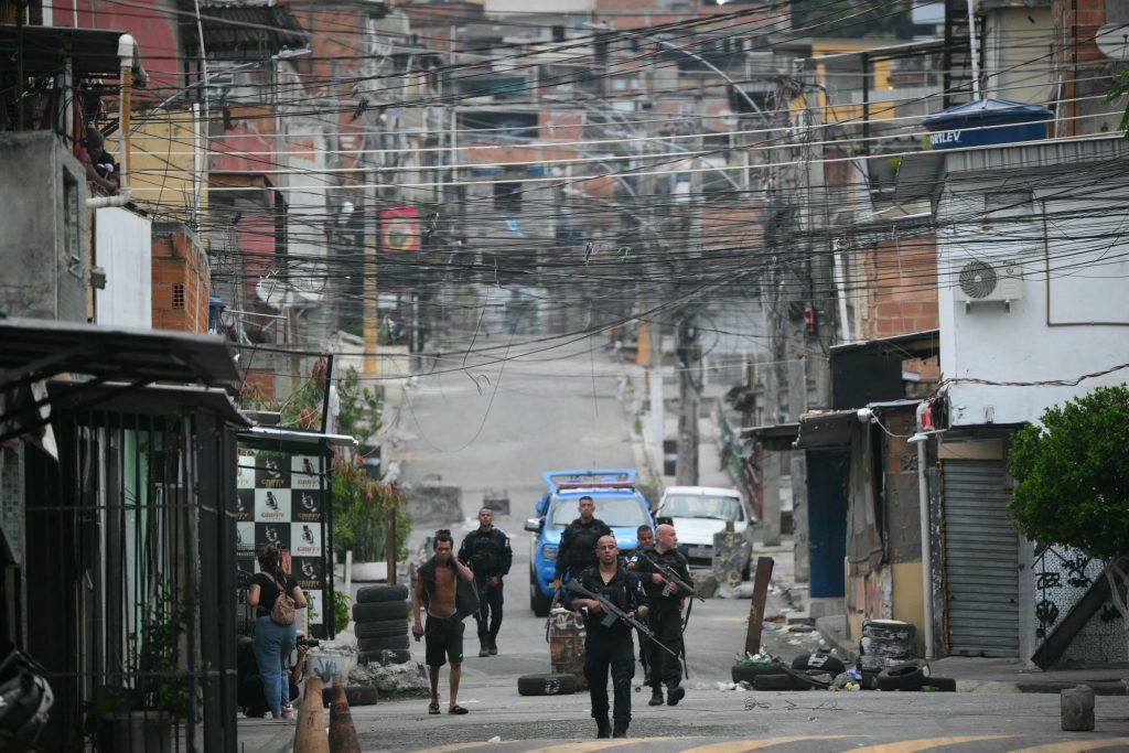 As many as 2,500 heavily armed officers, backed by armoured vehicles, helicopters and drones took part in the operation targeting Brazil's main drug-trafficking gang in two poor neighbourhoods, or favelas, in northern Rio.