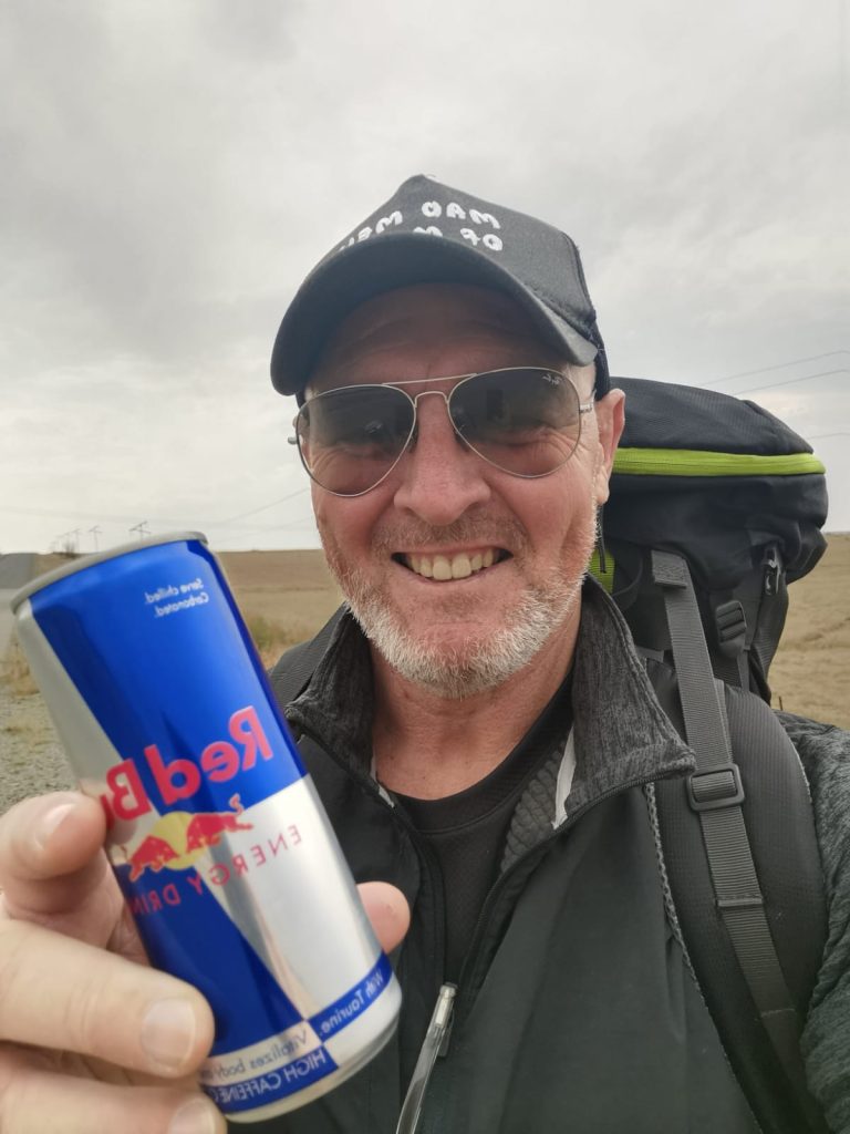 Germishuys receives Red Bull from kind stranger during his 1 600km charity walk across South Africa.