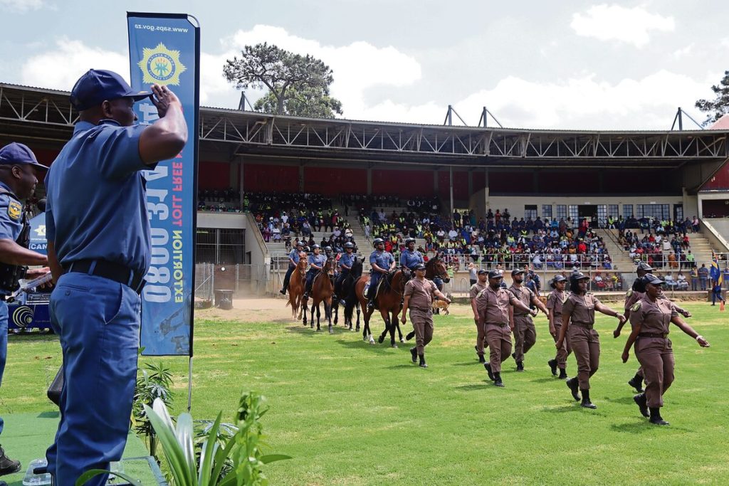 Officials of the Department of Correctional Services and the South African Police's Mounted Unit, make their way past Lieutenant General Adv. Thembisile Patekile during the parade. Photo: Yaël Malgas