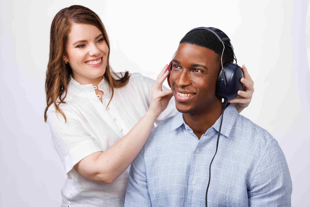 audiology hearing test. Audiologist conducting a hearing test on an adult man. 