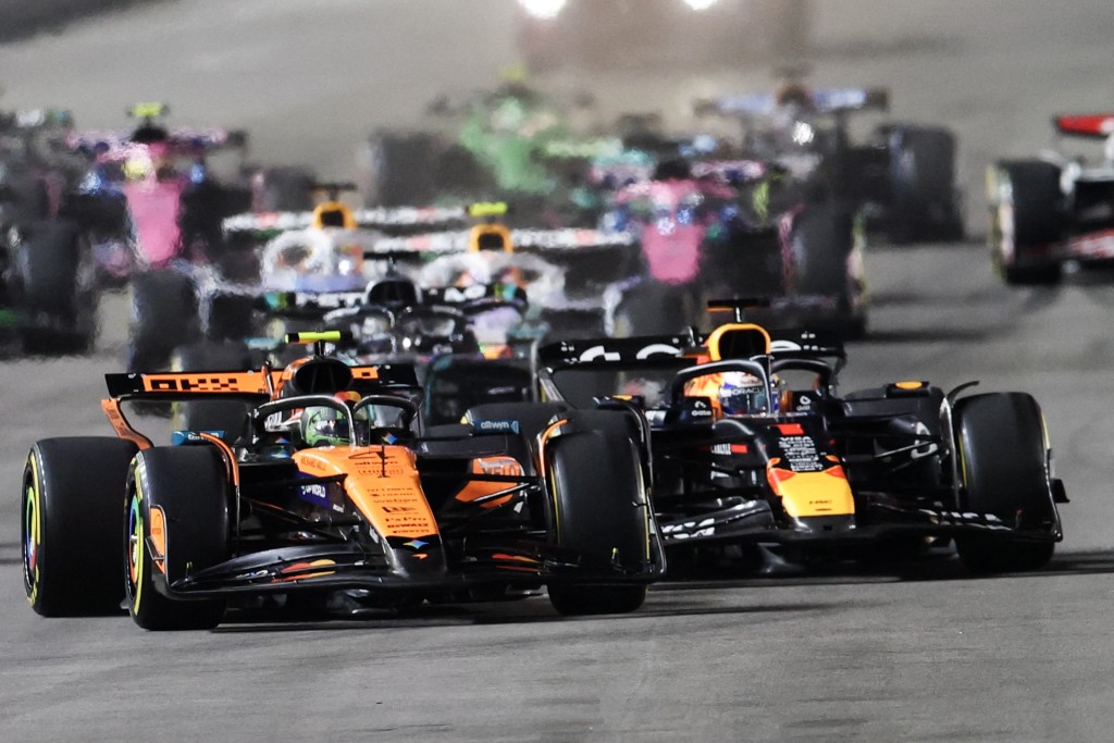 Lando Norris and Max Verstappen lead the pack at the start of the Las Vegas Formula One Grand Prix.