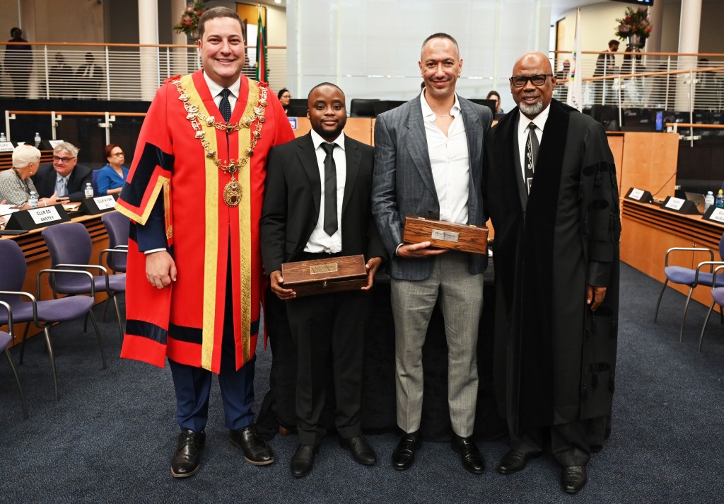 The Civic Honours Book recipients (from left) Cape Town mayor Geordin Hill-Lewis, Phola Bavuma (brother of Proteas cricketer Temba Bavuma who accepted on his sibling's behalf), award-winning filmmaker Oliver Hermanus, and city manager Lungelo Mbandazayo. Absent: Former Proteas cricketer Jacques Kallis and former politician Tony Leon.