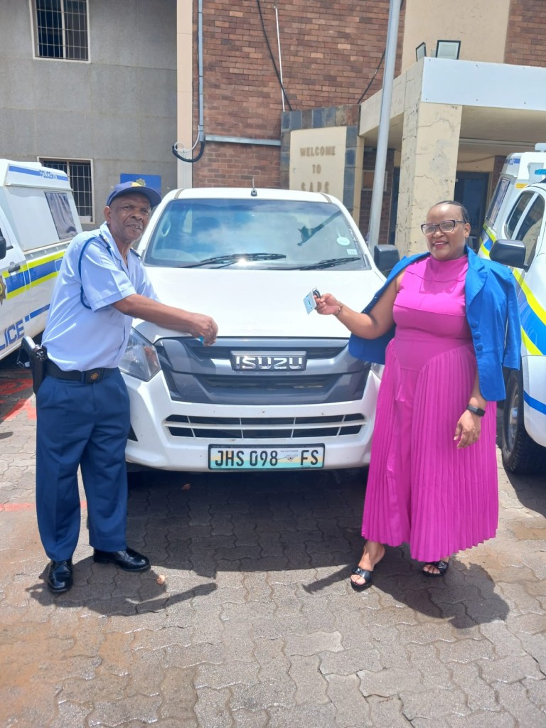 Pictured with one of the new vehicles is Capt. Stephen Gulling (shift commander), Col Matshediso Rulufu (Thabong SAPS crime room commander)