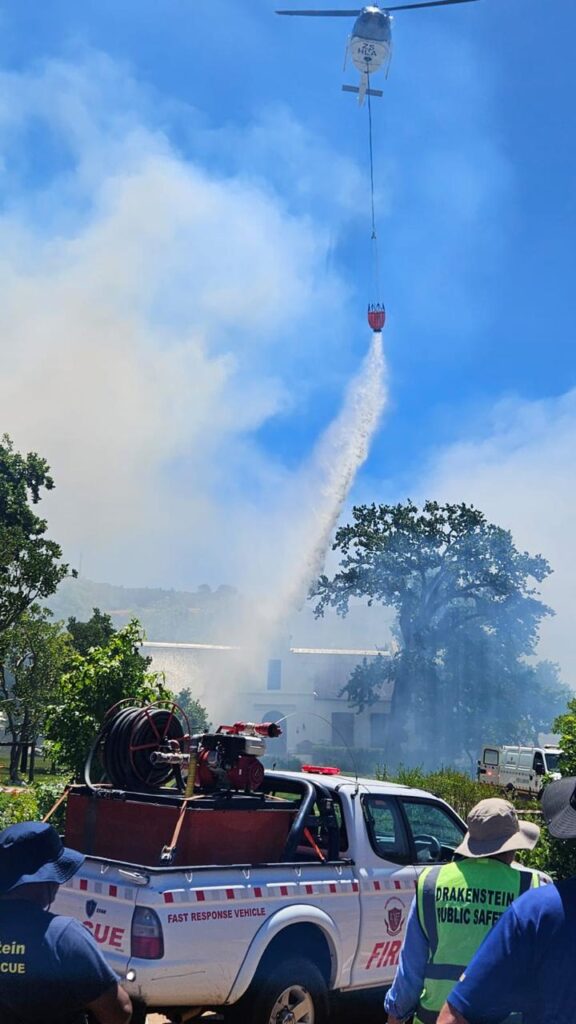 Aerial support helps douse the flames at Laborie Wine Estate in Paarl.