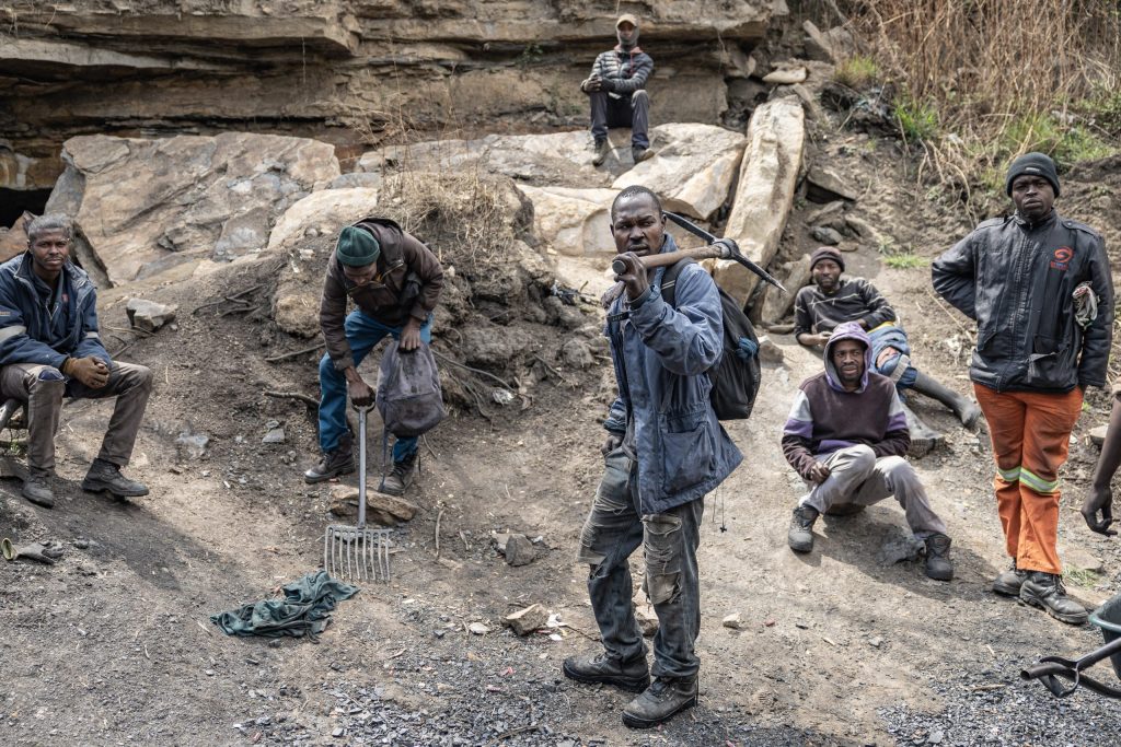 A coal miner works in dangerous conditions at an abandoned shaft near Ermelo, as South Africa's informal mining communities fight for recognition amid the country's transition away from fossil fuels.
