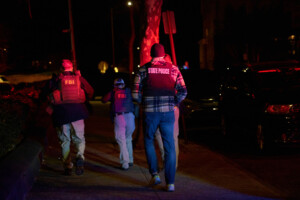 Police still hunt gunman who killed two, injured several, at Brown University