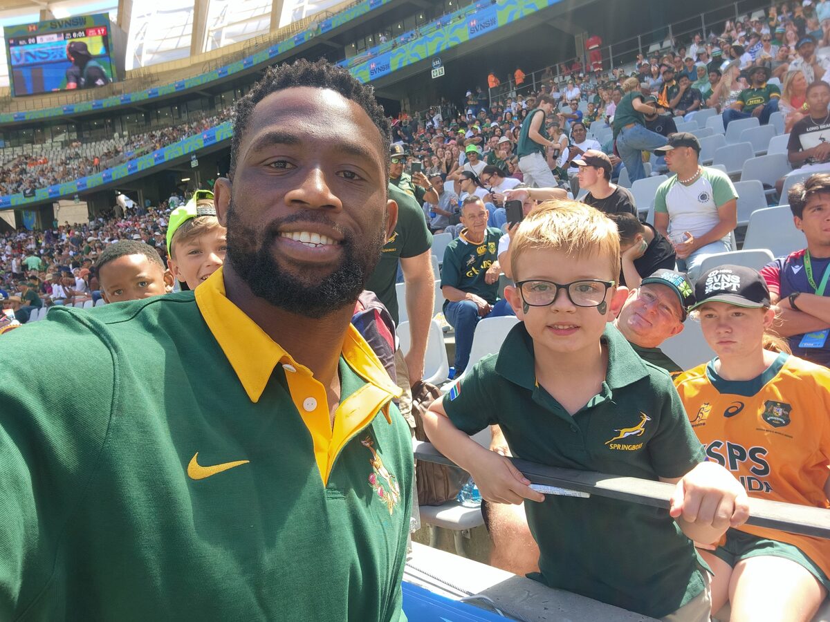 Josia with Springbok captain, Siya Kolisi at Cape Town Stadium.