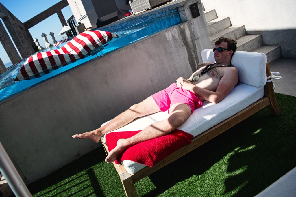 Hans Niemann (USA) chills poolside after taking gold in the Diving Chess Championship.