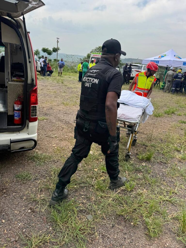 Rescue workers on the scene of the temple collapse.