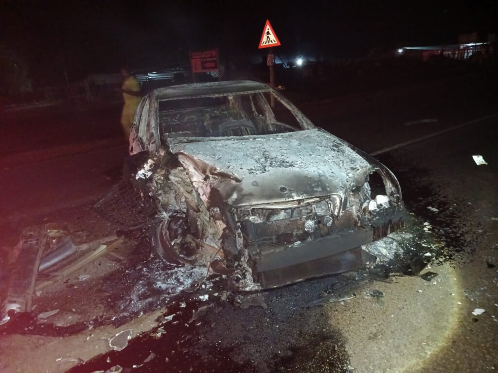 Armed suspects blocked a road with a burning car to ambush a cash-in-transit vehicle.