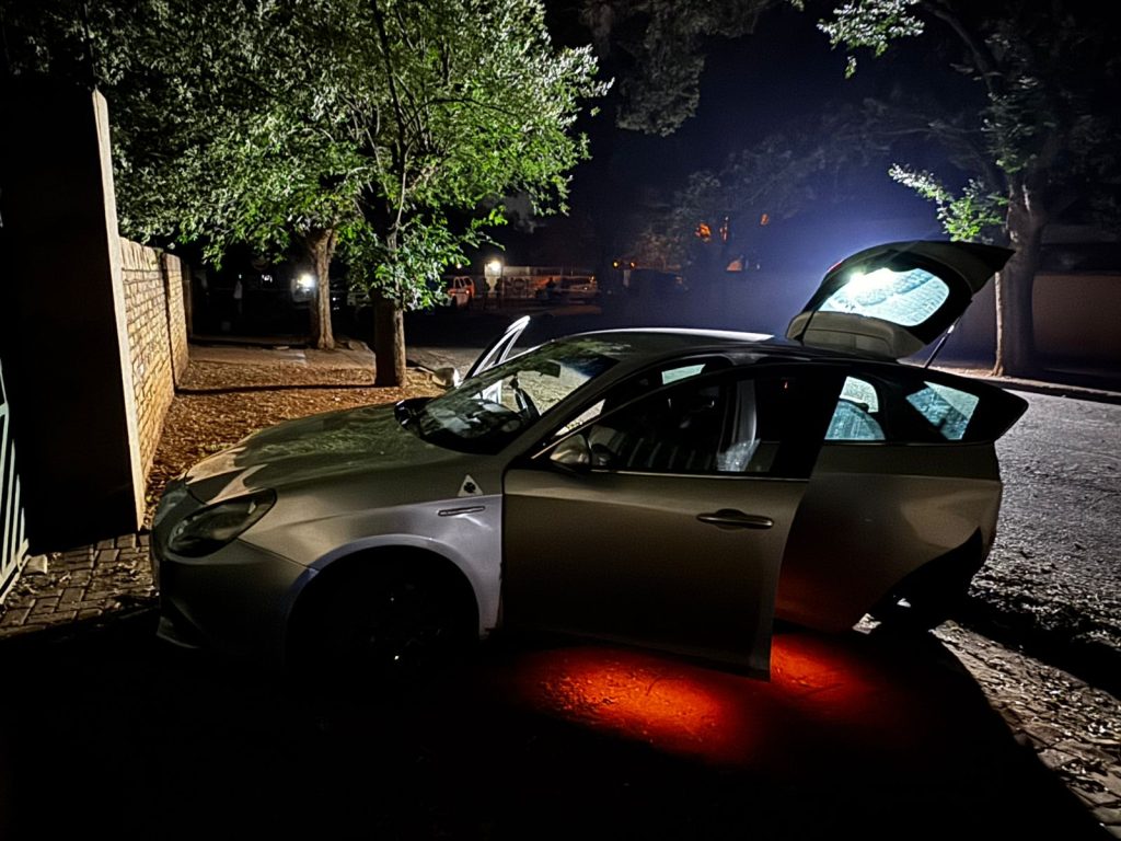 Marius van der Merwe's vehicle is pictured here at the scene where he was gunned down in full view of his wife.