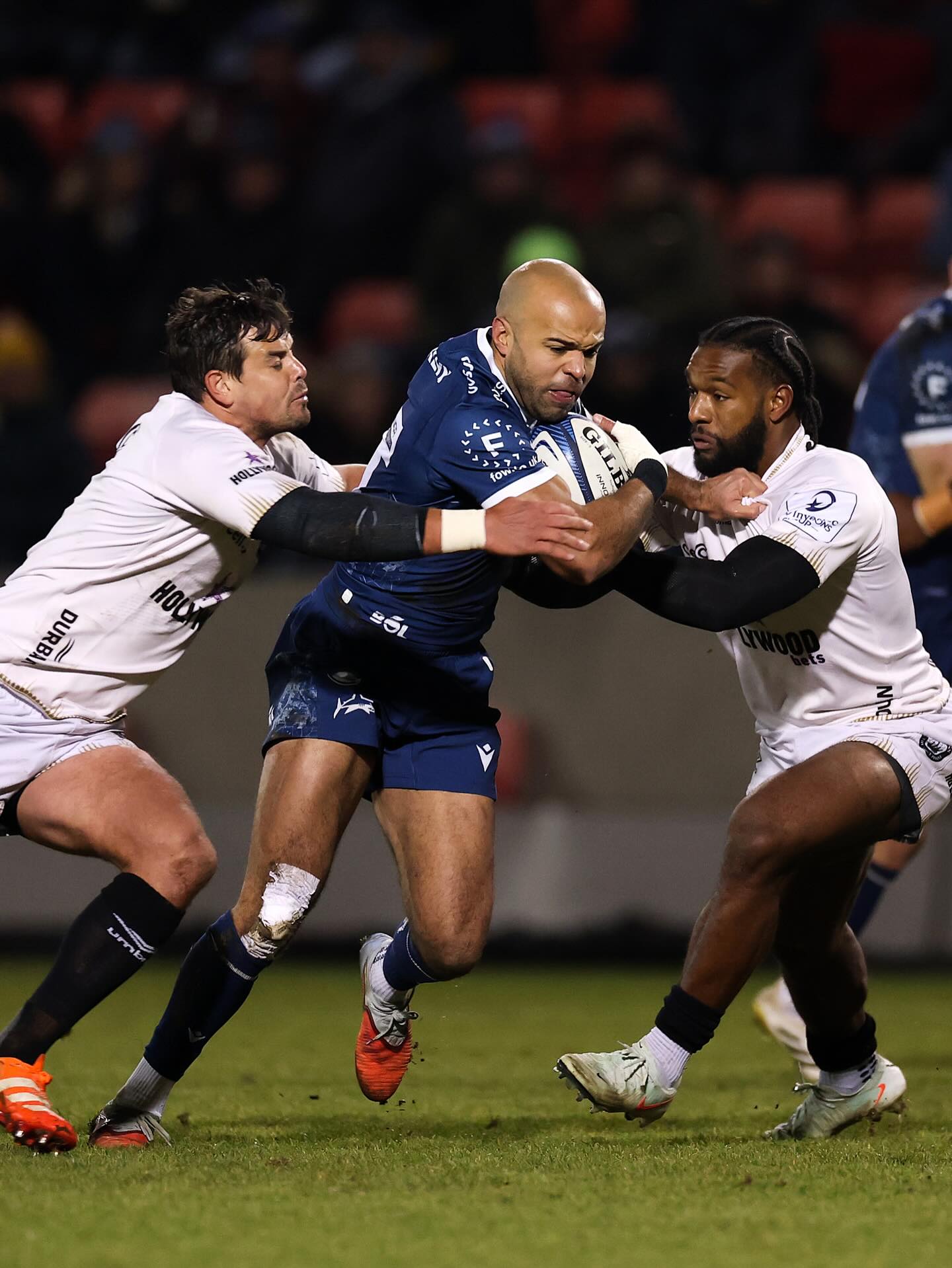 Sale Sharks claimed a dominant 26-10 bonus-point victory over their Durban namesakes in freezing conditions at Manchester's AJ Bell Stadium. Tom O'Flaherty scored twice as the English side controlled the EPCR Challenge Cup encounter, with powerful mauls proving decisive. Despite Tshituka's second-half try, the South African Sharks struggled to generate attacking continuity and never truly threatened their hosts in the battle of the Sharks.